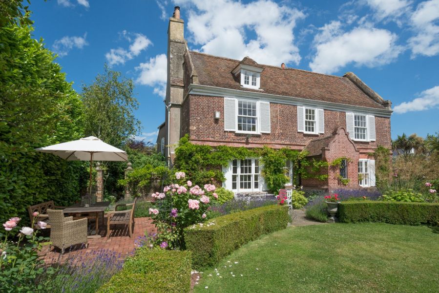beautiful period home with exquisite garden close to sea and station